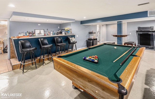 rec room with indoor bar