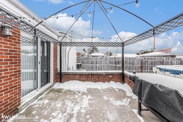 view of snow covered patio