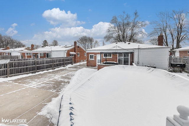 view of snow covered house