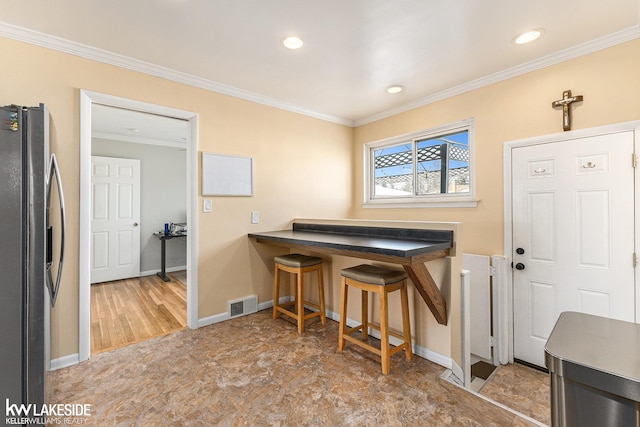 interior space featuring ornamental molding