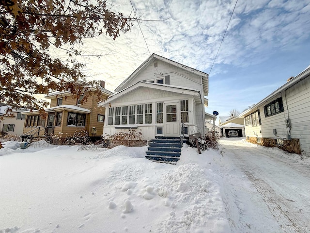 view of snow covered house