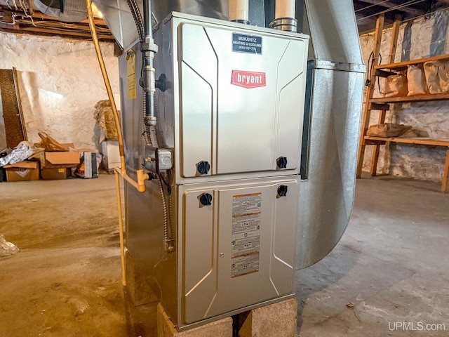 utility room with heating unit