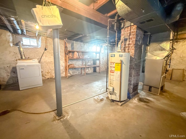 basement featuring washer / clothes dryer and gas water heater