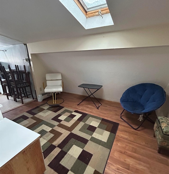 sitting room featuring dark hardwood / wood-style flooring