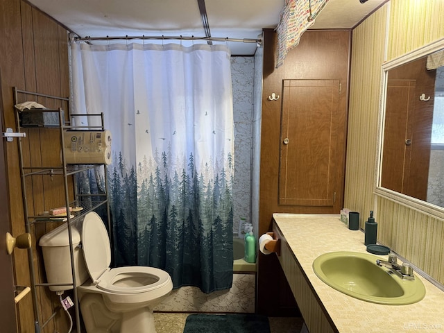 full bathroom featuring shower / tub combo, vanity, and toilet