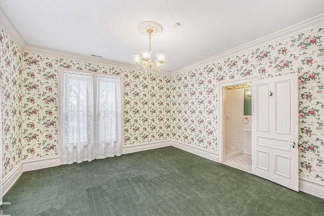 empty room featuring crown molding, a notable chandelier, and dark carpet