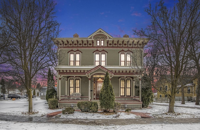 italianate-style house with a porch