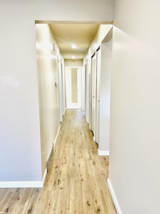 hall featuring light wood-type flooring