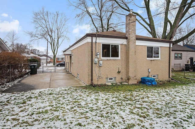 view of snow covered property