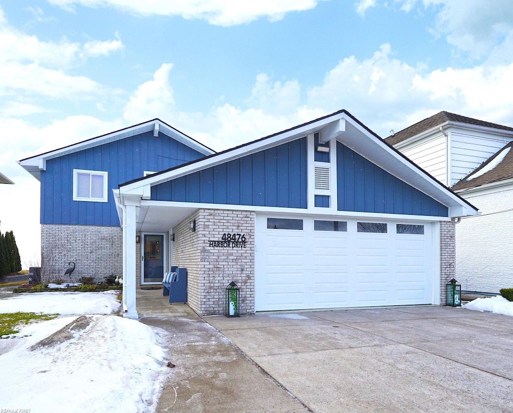 view of front of property with a garage