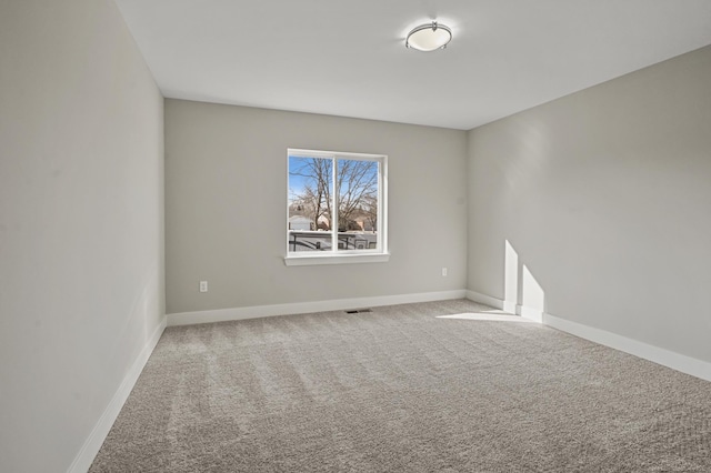 view of carpeted spare room