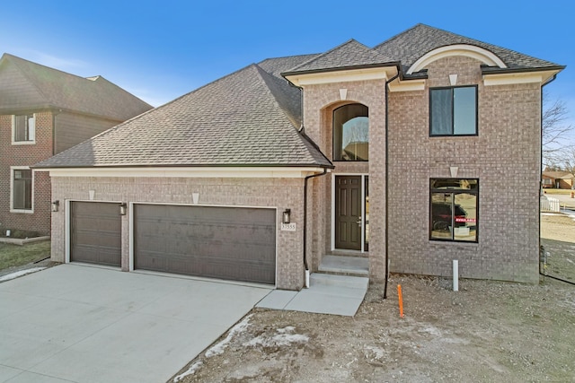 view of front of property with a garage