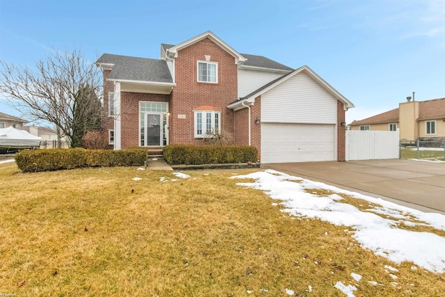 front of property with a garage and a front lawn