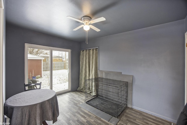 interior space featuring hardwood / wood-style flooring and ceiling fan