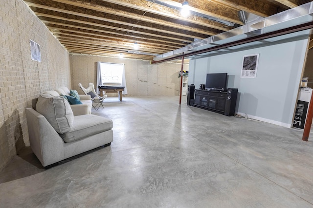 basement with brick wall