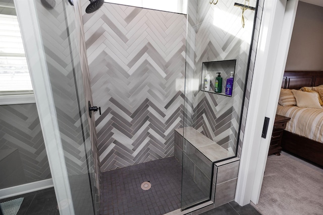 bathroom featuring tiled shower