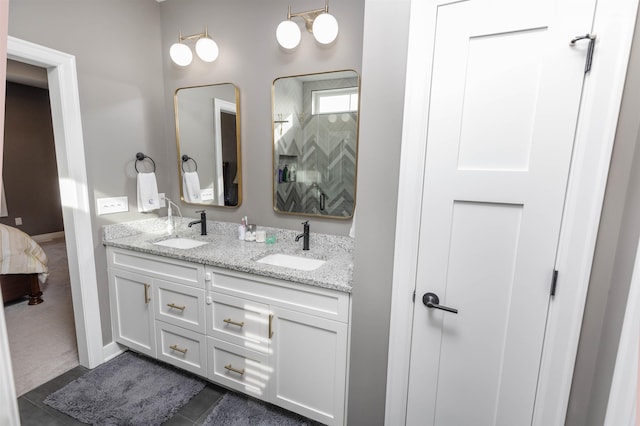 bathroom featuring vanity and tile patterned flooring