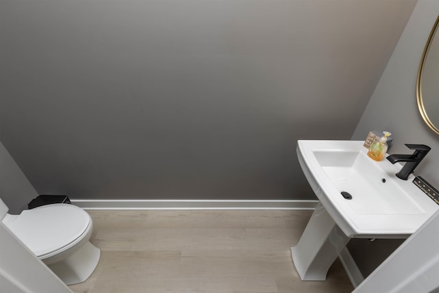 bathroom with sink and toilet