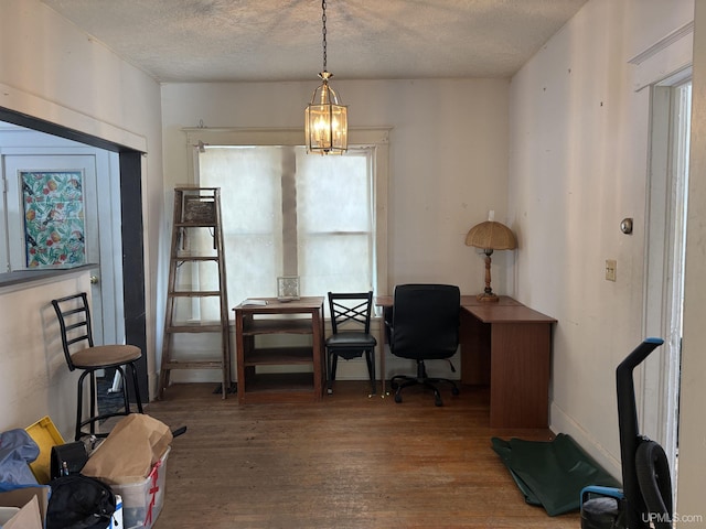 office space featuring hardwood / wood-style floors and a textured ceiling