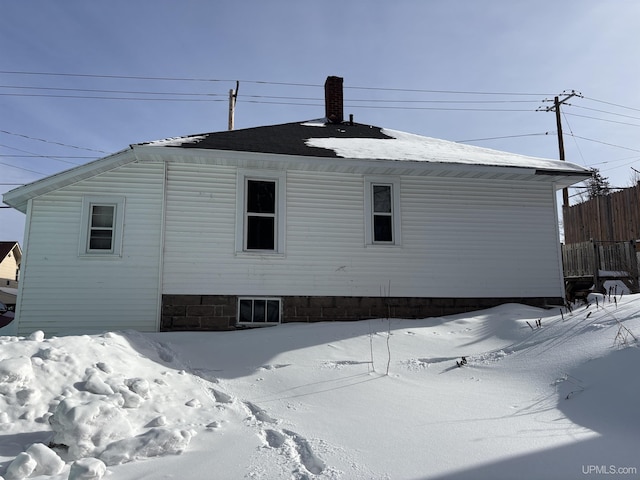 view of snow covered property