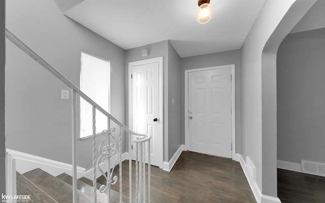 foyer featuring dark hardwood / wood-style floors