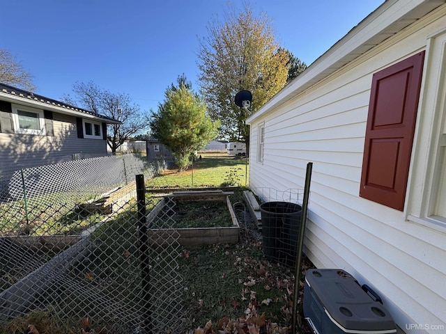 view of yard featuring central AC unit