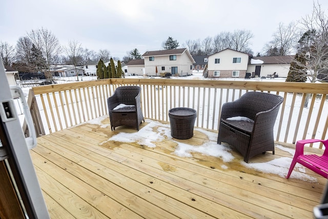 view of snow covered deck