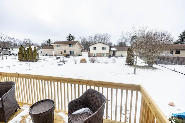 view of snow covered deck