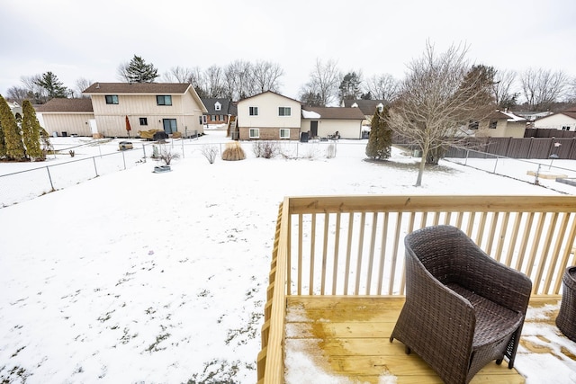 view of yard layered in snow