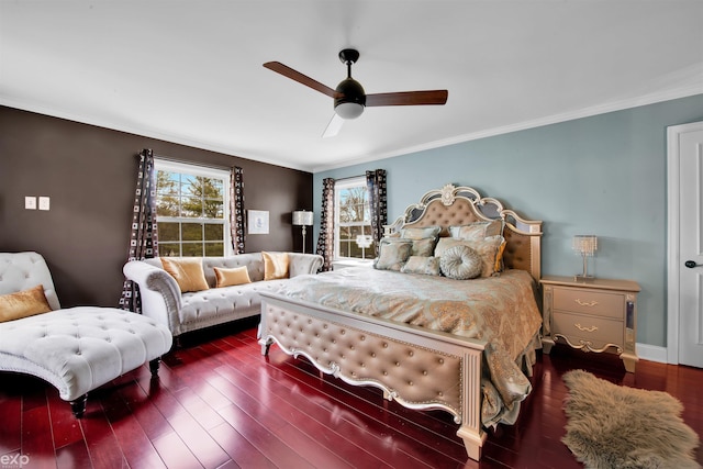 bedroom featuring multiple windows, ornamental molding, and dark hardwood / wood-style floors