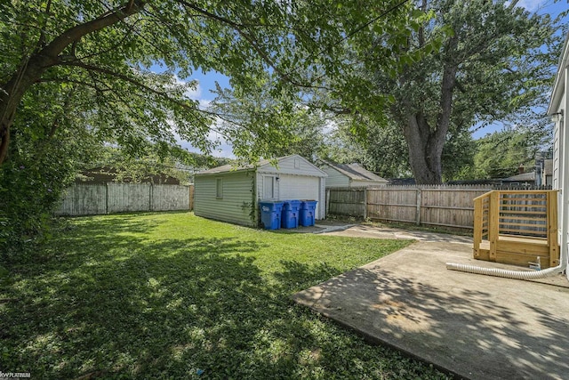 view of yard featuring a patio area and an outdoor structure