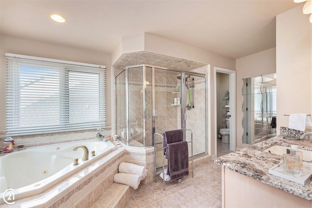 full bathroom with vanity, tile patterned floors, independent shower and bath, and toilet