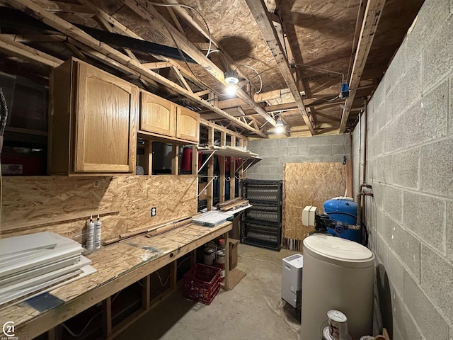 interior space featuring a workshop area and concrete floors