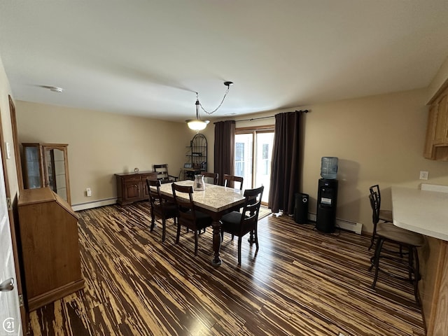 dining room featuring a baseboard radiator and dark hardwood / wood-style floors