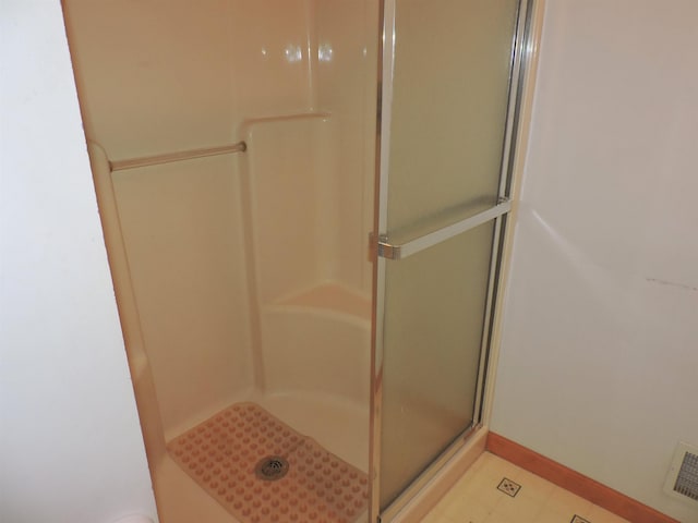 bathroom featuring walk in shower