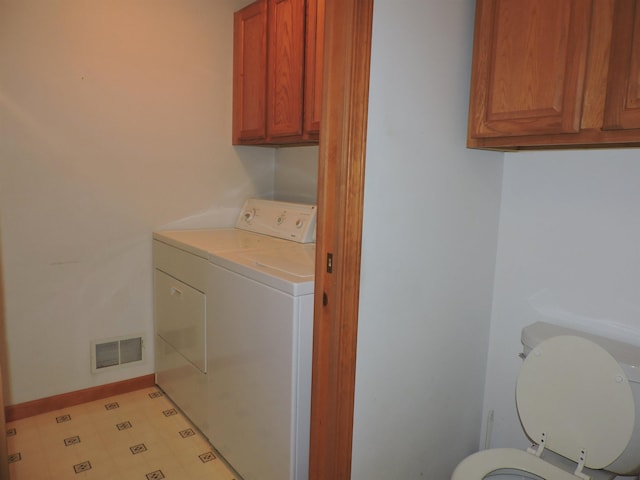 laundry room featuring independent washer and dryer