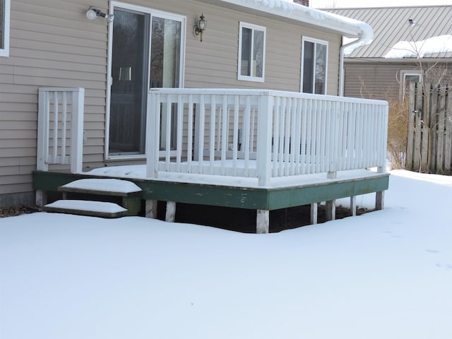 view of snow covered deck