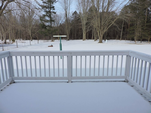 view of snow covered deck