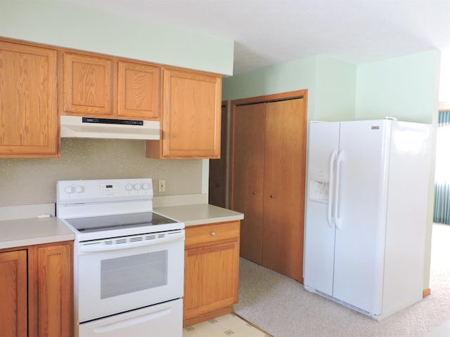 kitchen featuring white appliances