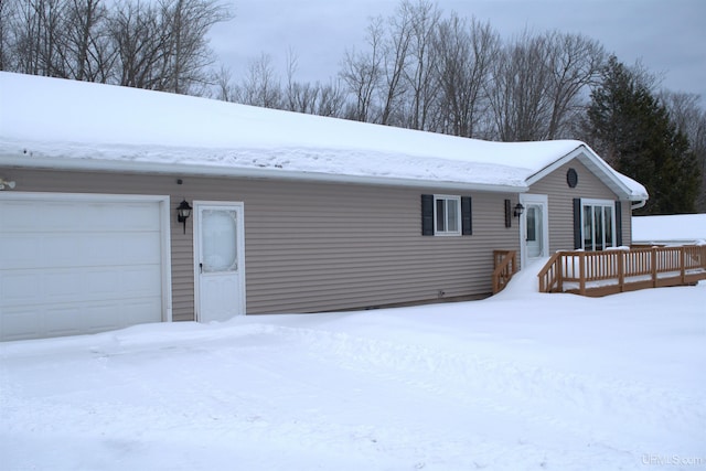 single story home with a garage