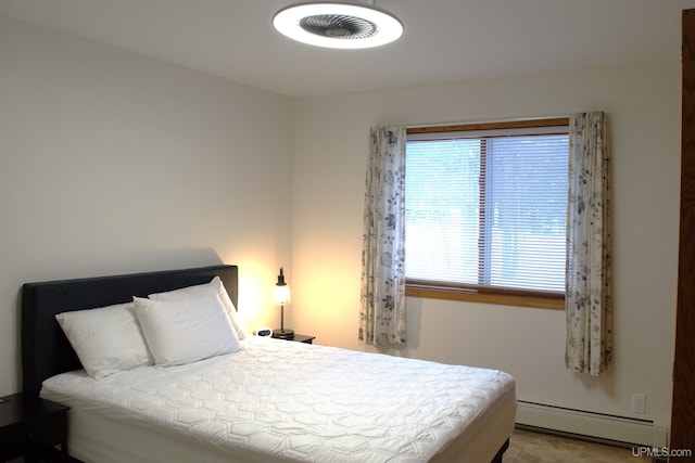 bedroom featuring a baseboard radiator