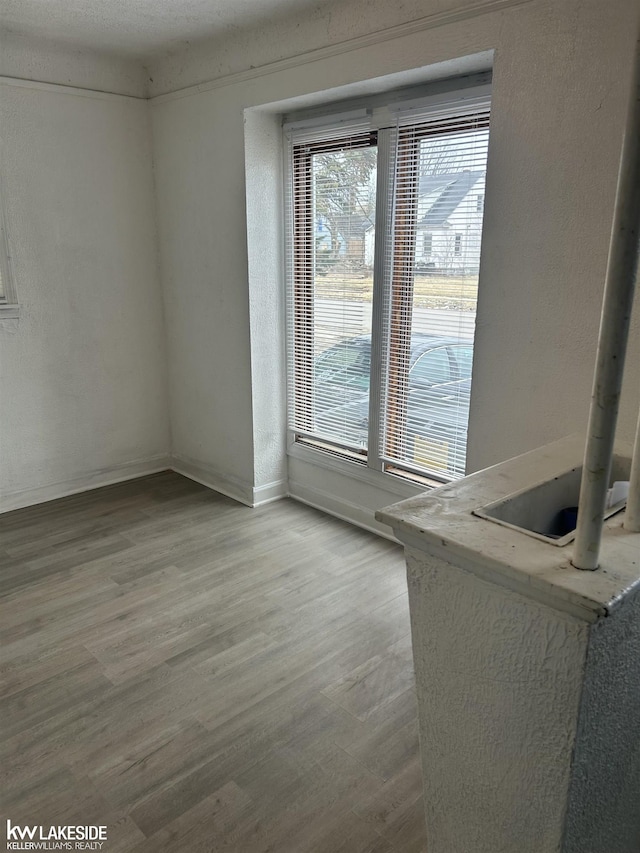 empty room featuring hardwood / wood-style floors