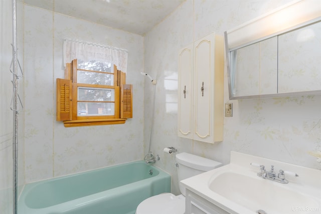 full bathroom with vanity, bathing tub / shower combination, and toilet