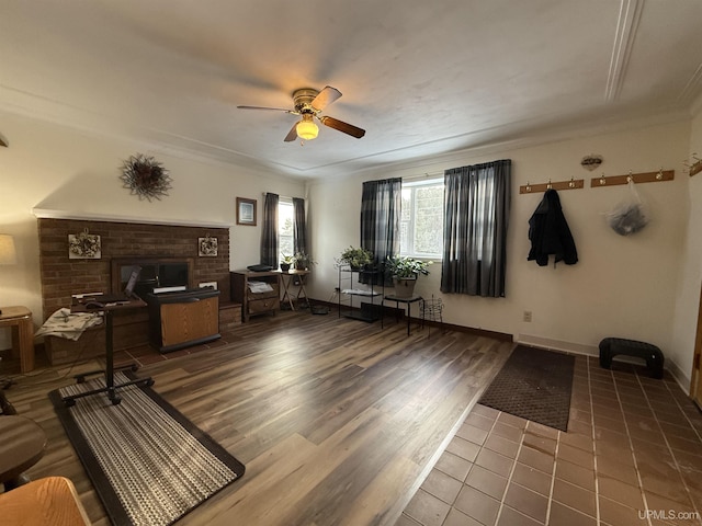 interior space featuring ornamental molding, hardwood / wood-style floors, and ceiling fan