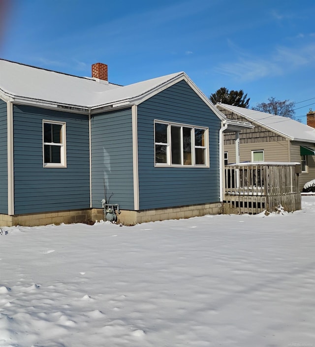 view of snow covered property