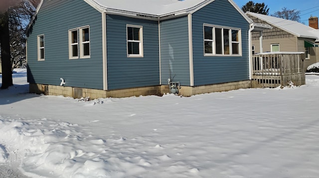 view of snow covered property