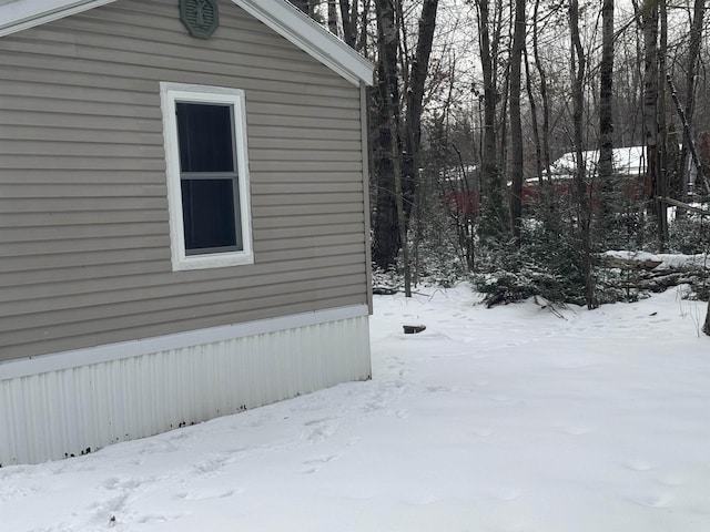 view of snow covered property