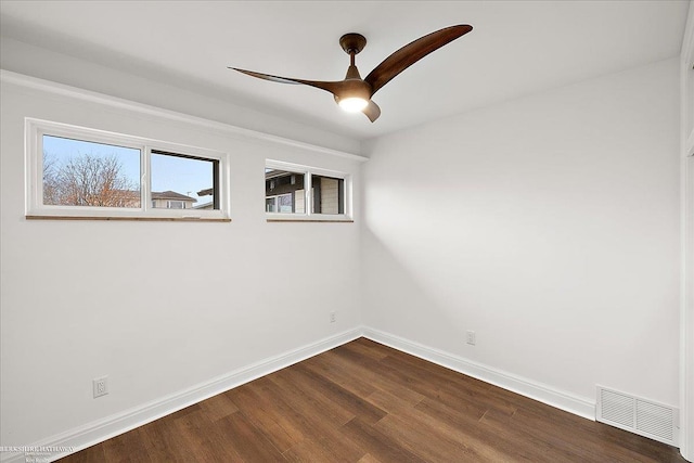 unfurnished room with hardwood / wood-style flooring and ceiling fan