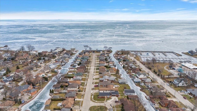 bird's eye view with a water view