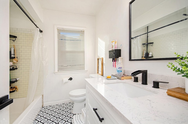 full bathroom with shower / tub combo with curtain, vanity, toilet, and tile patterned flooring